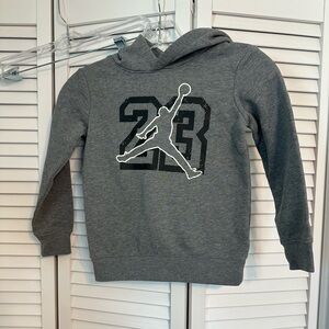 Jordon size small (4 to 5 yrs) gray and black hoodie